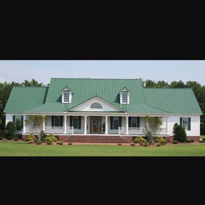 Complete exterior restoration.  Metal, roof siding, gutters, soffit, & fascia