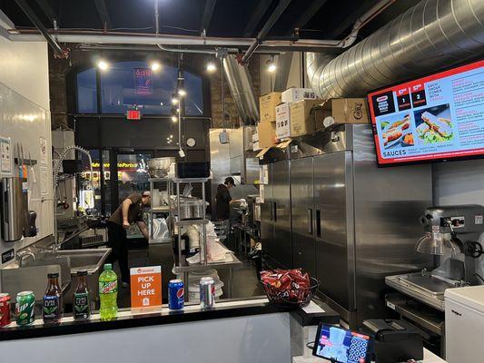 Open kitchen can be seen from where are you order and everything looked cleaned