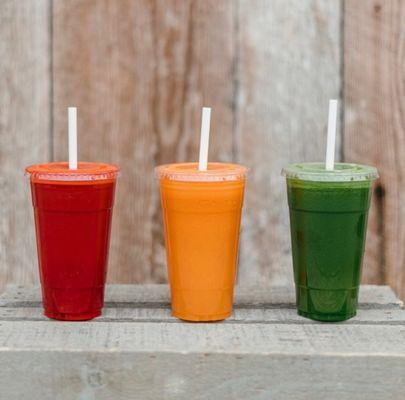 Fresh beet juice, carrot juice, & green juice.