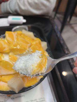 Mango bingsoo - ordered with extra mochi. Snow covered in mango and condensed milk