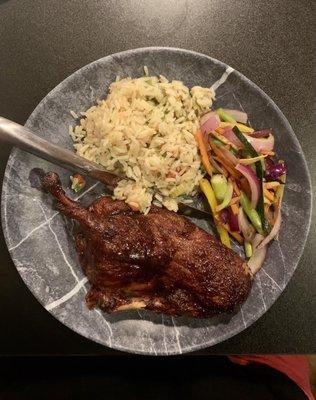 Duck Confit with Vegetable medley and rice pilaf