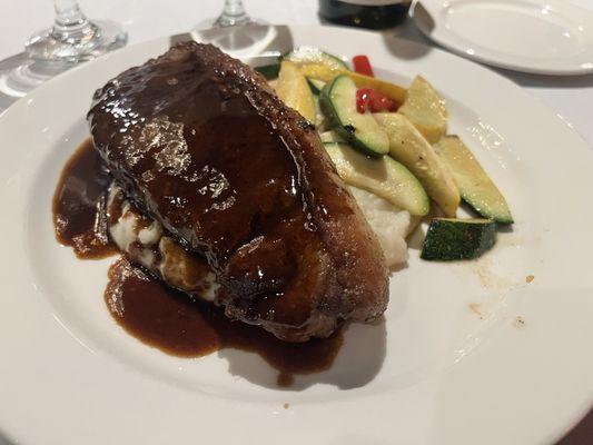 New York steak with whipped mashed potatoes and grilled seasonal vegetables