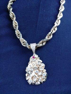 10 mm 14 karat gold rope with gold nugget and diamonds plus one Ruby