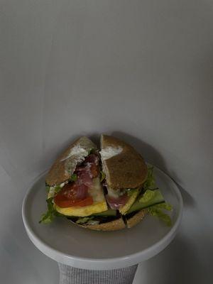 Sausage, Egg & Cheese I added: tomato, cucumber, pickled red onion, plain cream cheese, avocado & lettuce.