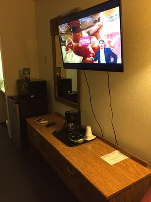 fat screen tv and coffee maker