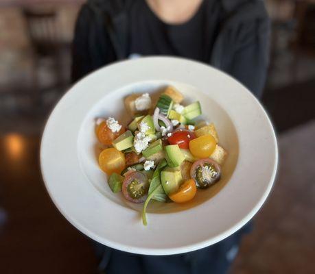 Heirloom tomatoes, cucumber, feta cheese, red onion, avocado, red wine vinaigrette.