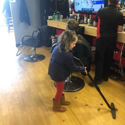 What do you do while waiting for your brother to get his haircut?  You vacuum of course!