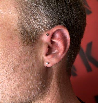 FORWARD HELIX PIERCING BY JAY KIANA