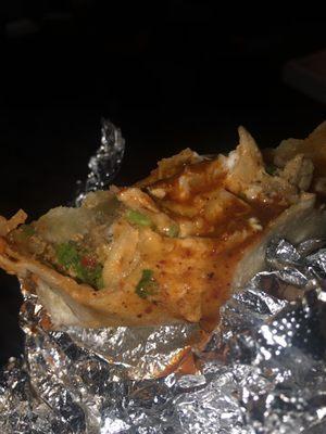 Steak super burrito after I tore it up  and added hot salsa on top. Idk about anyone else but I love a juicy burrito !