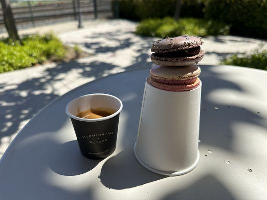 The coffee and the macarons (Blueberry Lavender on top and the Rose on the bottom)