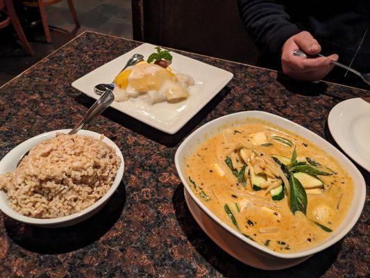 Red curry with tofu, brown rice, and mango sticky rice.