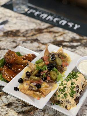 Mango habanero wings, loaded nachos with brisket, dirty fries.