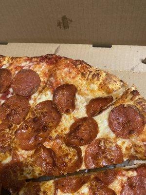 This is what we've been getting lately. This is not double cheese and double pepperoni. Obviously not compared to the other photos.