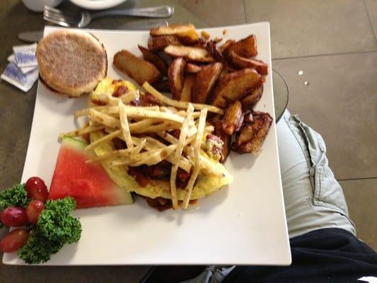 Spanish omelet with chorizo, crispy tortilla strips and chunky salsa. Very tasty.