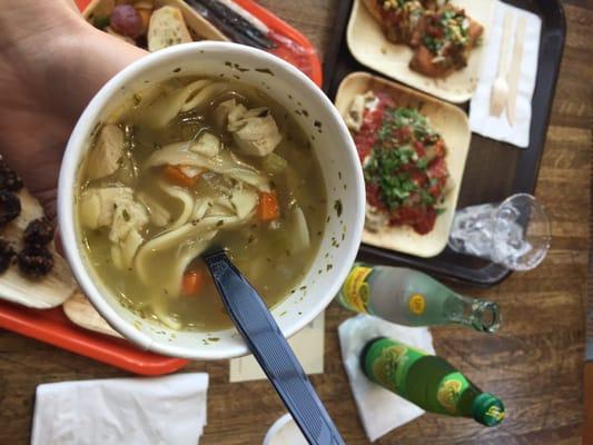 Chicken noodle soup. If the container is cool to the touch ask them to nuke it I guess.