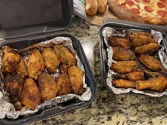 Lemon Pepper Wings (box on left seasoned nicely, box on right see the pile of seasoning in the bottom)