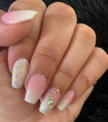 French ombré coffin nails w/a hint of sparkle at a friendly & peaceful establishment. They do not disappoint w/their services.