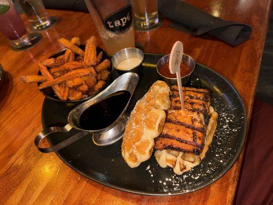 Southern fried salmon and waffles with sweet potato fries