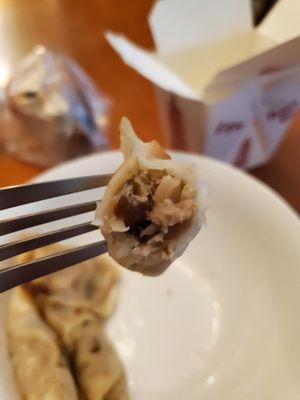 home-made dumplings - side view of filling