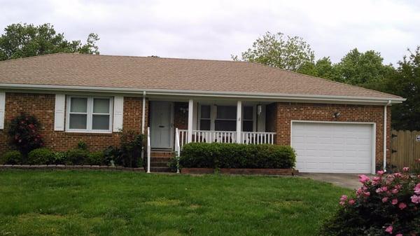 New Roof and Gutters on single family house located in Virginia Beach.