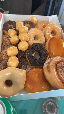 Creme brûlée doughnuts, maple, chocolate , cinnamon twist, glazed, doughnut holes