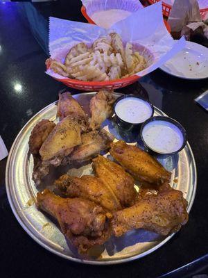 10pc half lemon pepper, half spicy lemon pepper wings with fries and an extra ranch