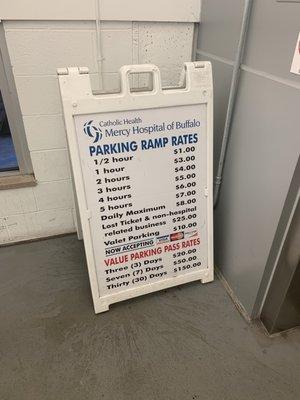 This is helpful. Right by the elevator on the ground floor of the parking structure.