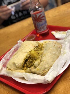 Chicken roti with shandy sorrel in the back ground