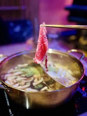 USDA prime Ribeye, Shabu Shabu with bone broth and Tom yum