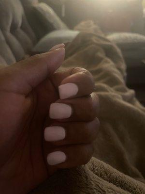 Left hand, pinky nail is a more oval shape