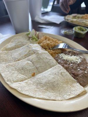 Al Pastor Quesadilla plate with rice and beans.