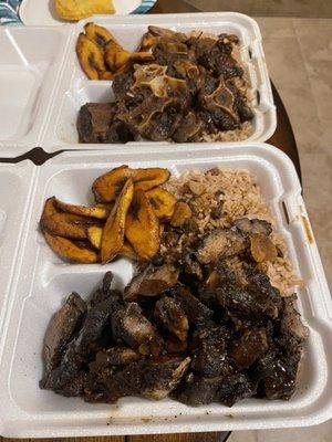 Jerk pork and oxtails with rice and peas and plantains. Awesome!