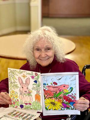 Mom with two of her drawings