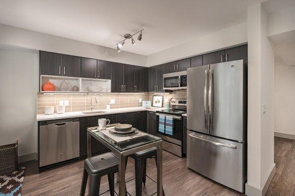 South Building apartments equipped with premium quartz countertops, onyx-finish cabinets and modern lighting