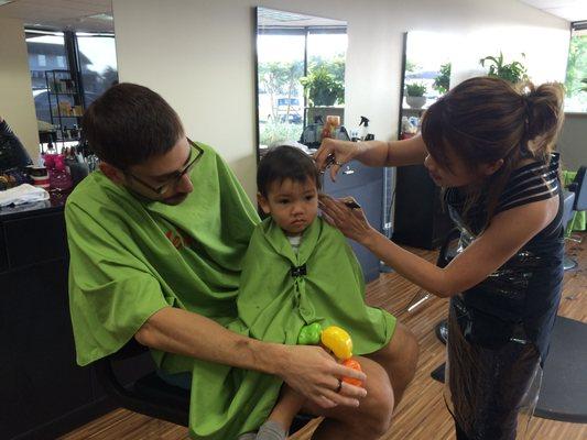 My son's first haircut, with Chi.