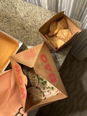 Dumplings and crab ragoons from bao wow not even Krispy rice