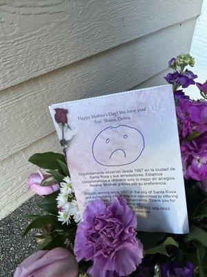 My mom putting her Mother's Day flowers out for pick up.