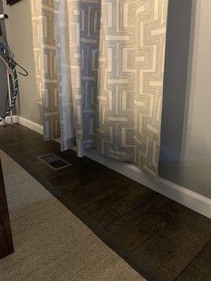 Curtains no longer touch the floor with a slight puddle but hey even higher than the baseboard.