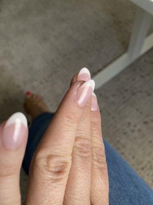 Left ring finger was so uneven when filed that she took way too much off one side, which was the left side of the nail.