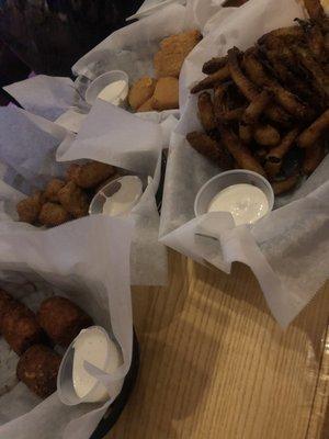 Pickle fries, loaded tater tots, Mac n cheese bites, and broccoli and cheese bites.