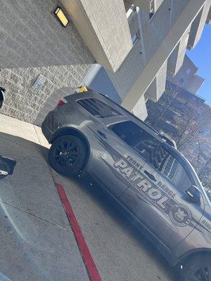 Officer blocking a "no parking handicap ramp." Photo taken by resident and wheelchair user who now can't leave.