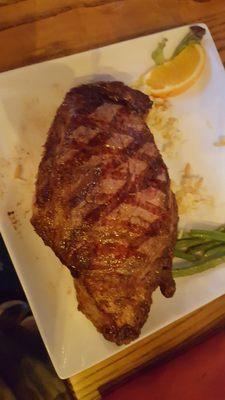 Sorry ate the sides but this is a 32oz, steak....yes 32oz. One of the most tender I have ever had.  At a grea.  Would highly recommend.