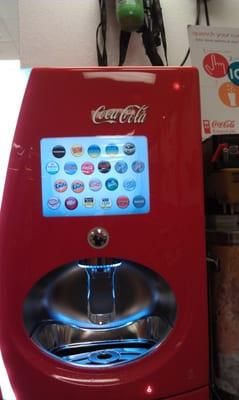 the crazy awesome coke fountain drink dispenser