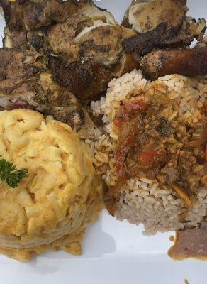 Rice and peas Mac and cheese gravy jerk chicken