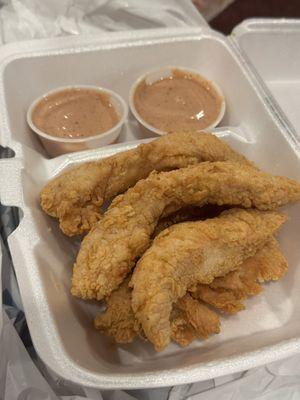 bunch of tenders and cane sauce