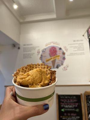 Thai iced tea ice cream in a waffle bowl