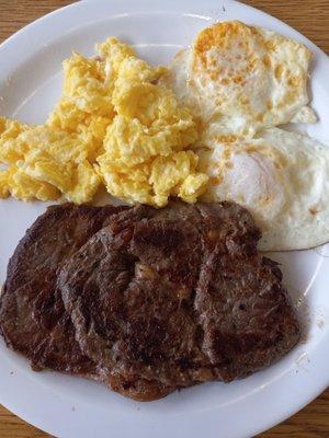 Ribeye, 2 eggs over medium and 2 scrambled eggs. Good but a little light on the salt.