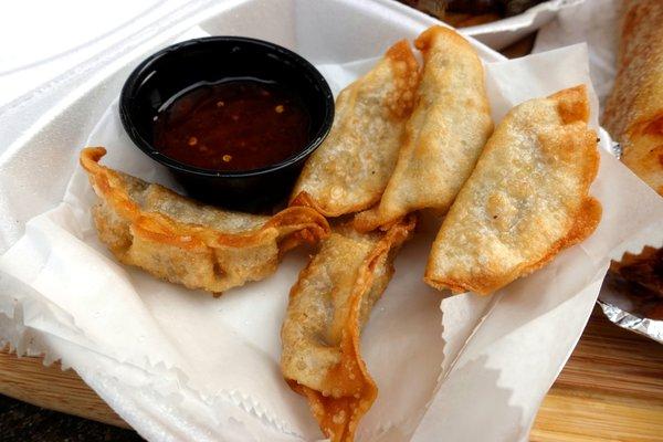 Pork-Stuffed Potstickers w/ sweet chili sauce