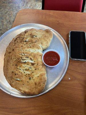 Calzone with meatballs and sausage