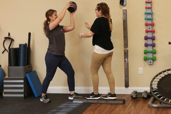 Diana is helping with ankle stability and balance exercises, performed to help recover from a serious injury